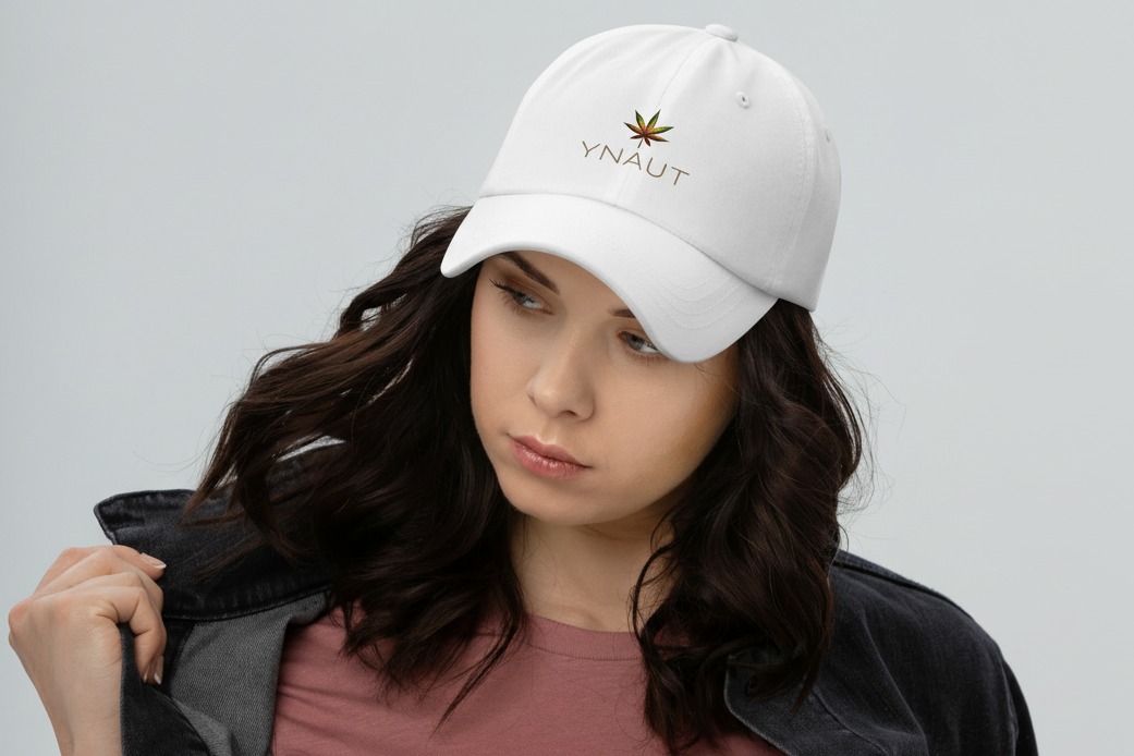 ynaut-apparel minimalist white cap with rasta-inspired color tones and relaxed fit